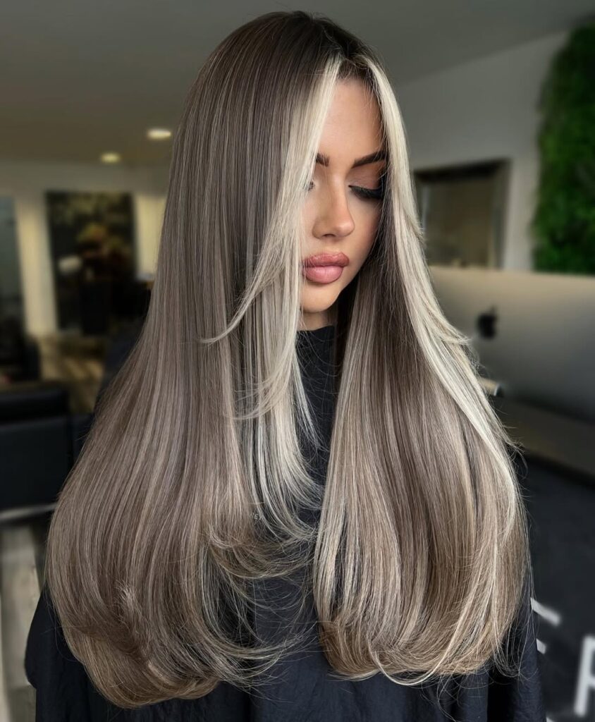 straight ash brunette hair with bright blonde face framing highlights and layers