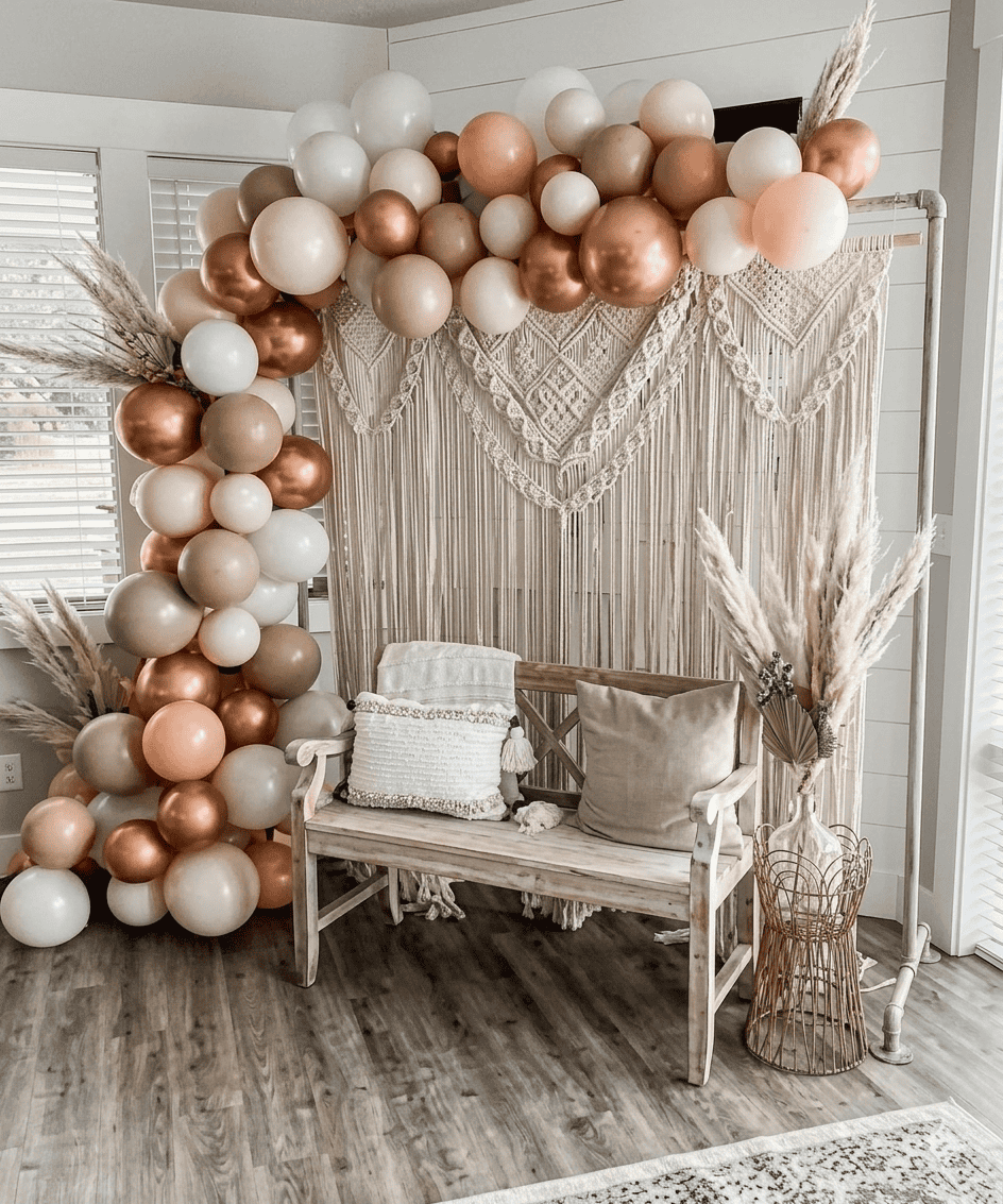 boho bridal shower backdrop with macrame and brown and copper balloons.