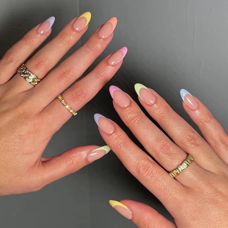 pastel skittle french manicure with various colored tips