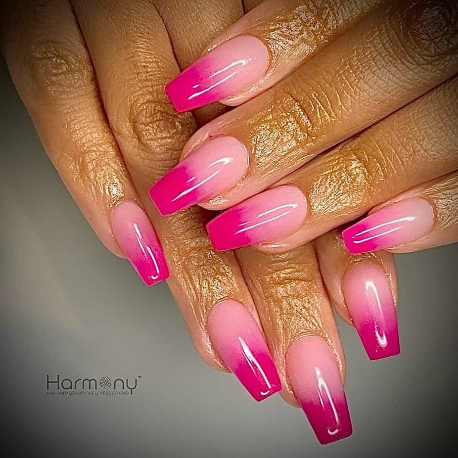 gradient pink nails in a coffin shape