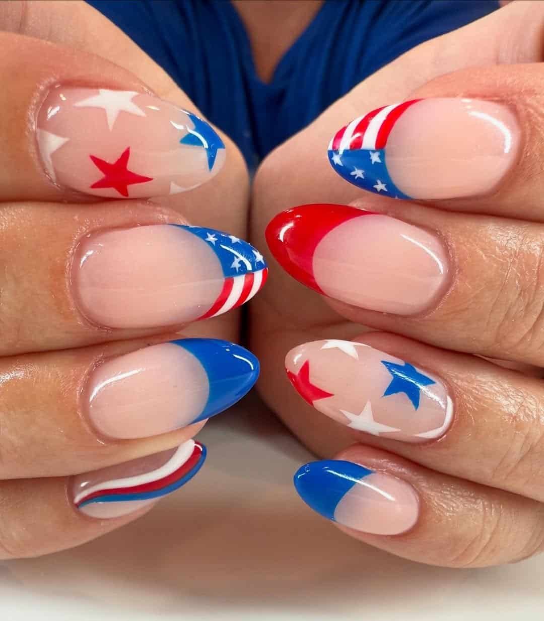 long oval nails with french tips and red, white, and blue stars.