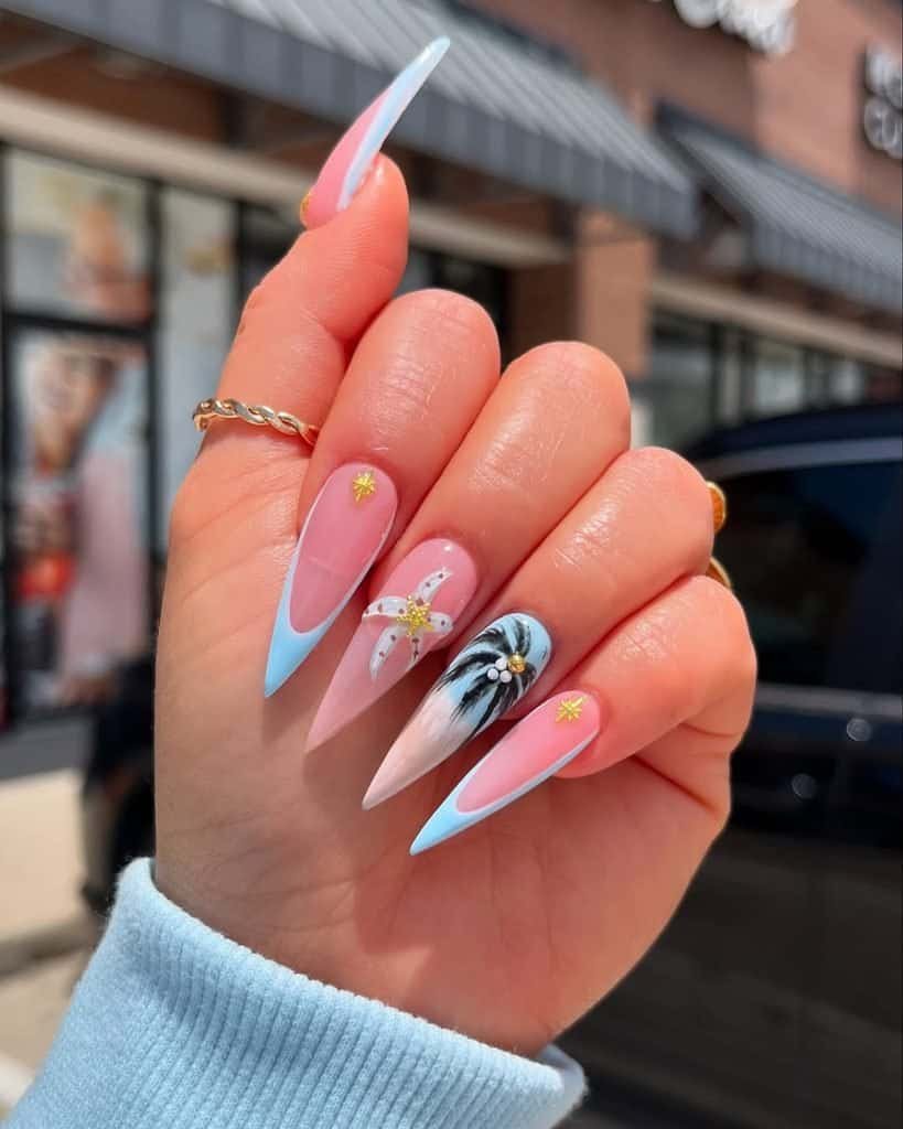 pointed stiletto nails featuring light blue french tips starfish art and painted palm trees