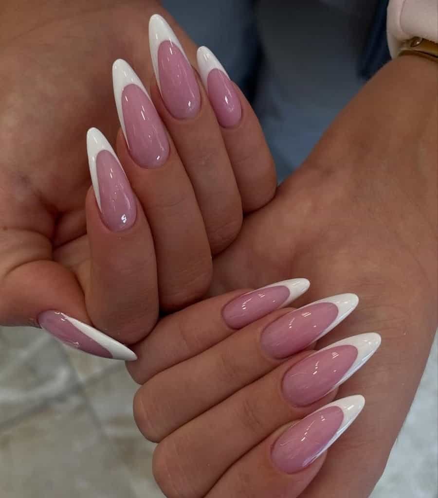 classic white french tip manicure on long elegant oval-shaped acrylic nails