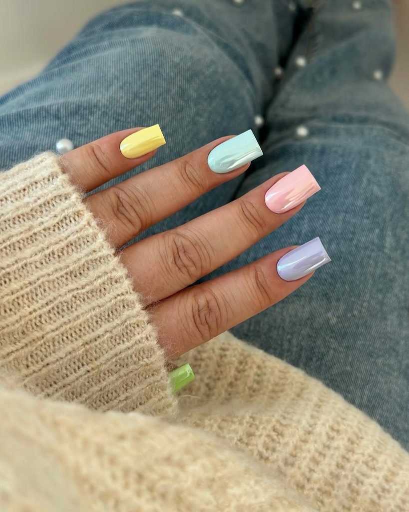 colorful pastel chrome square nails with a knit sweater background
