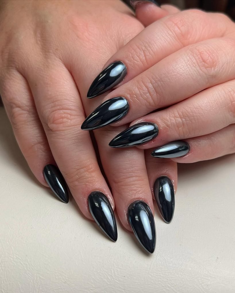 long pointed stiletto nails with glossy black metallic chrome finish