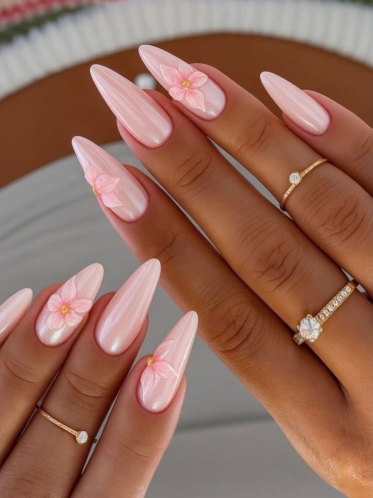 long pink iridescent almond nails with raised floral 3d nail art