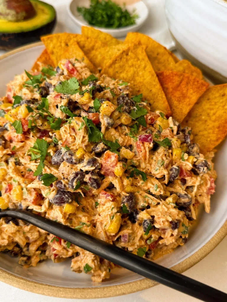 creamy southwestern chicken salad served with tortilla chips and fresh cilantro